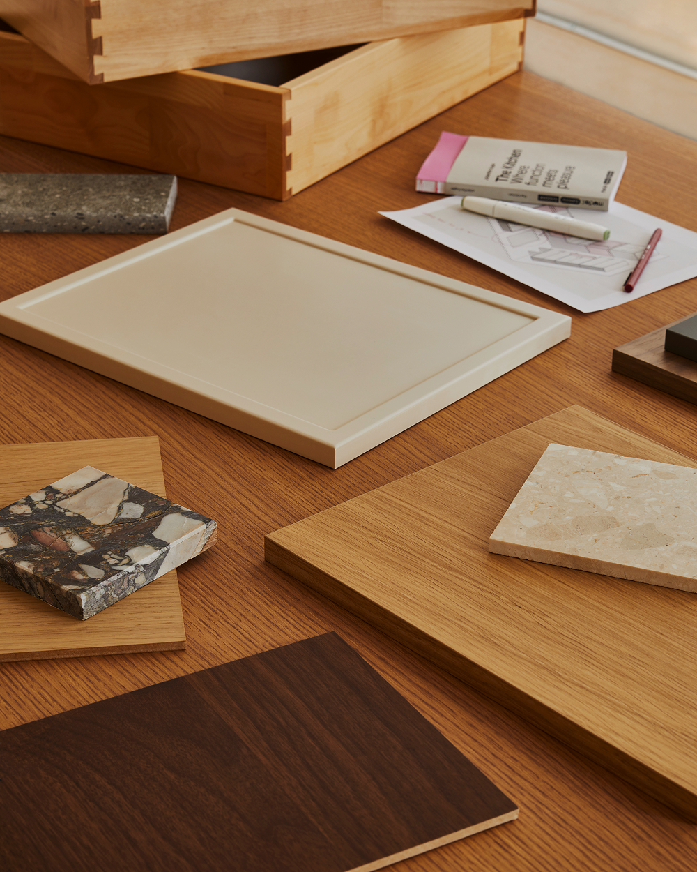 Door finish samples spread across a wood table